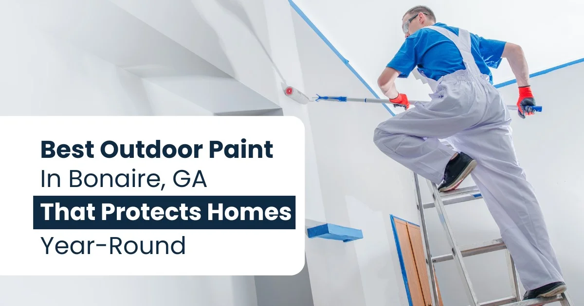 Professional painter applying best outdoor paint in Bonaire, GA, on a home interior, emphasizing year-round protection.